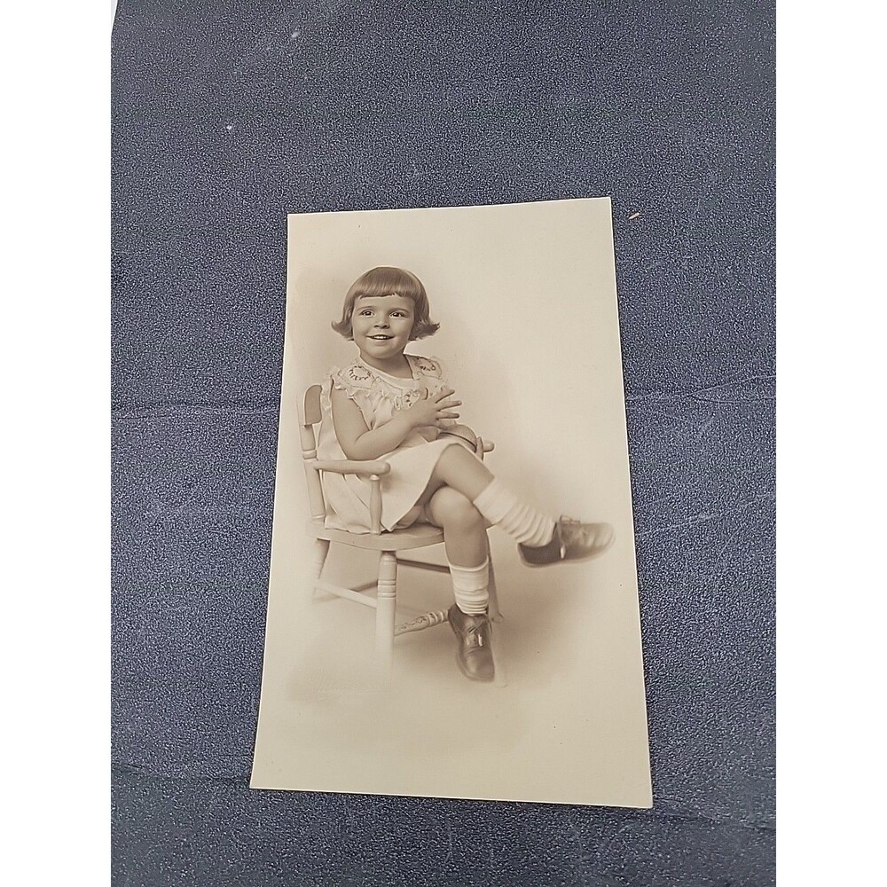 Vtg Photo Sepia Toddler Girl Sitting In Chair Happy Smile Portrait